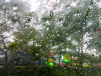 Wet glass window in rainy season