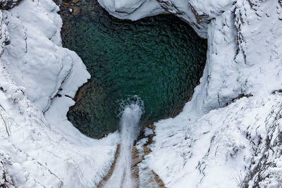 High angle view of snow covered land