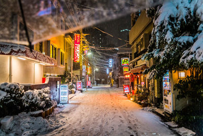 Illuminated street at night