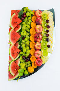High angle view of fruits against white background