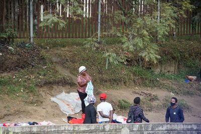 People sitting in the forest