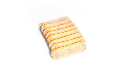 Close-up of bread against white background