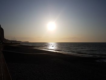 Scenic view of sea against sky at sunset