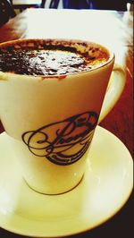 Close-up of cappuccino on table