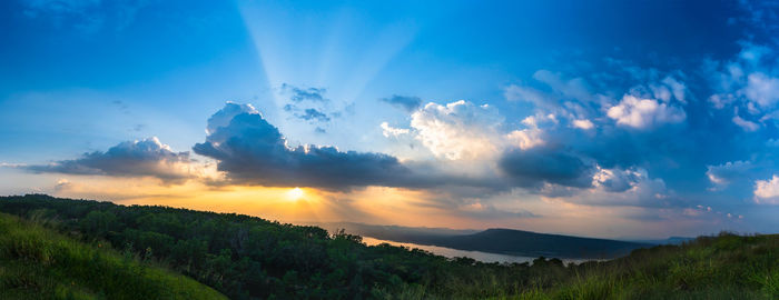 Panoramic view of landscape against sky during sunset