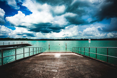 Pier over sea against sky