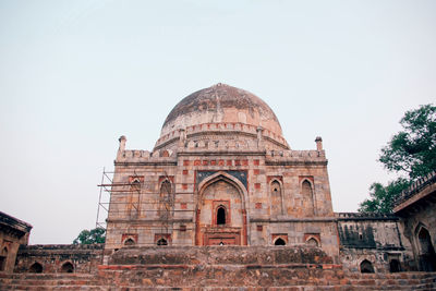 Low angle view of historic building against clear sky