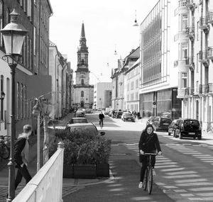 People walking on city street