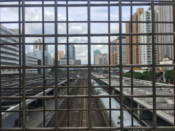 Reflection of buildings on glass window