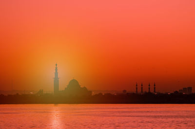 View of buildings against sky during sunset