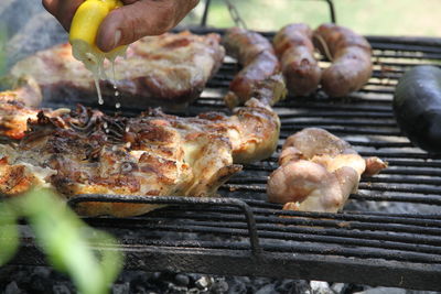 Close-up of meat on barbecue grill