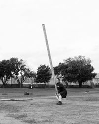 Rear view of man standing in park