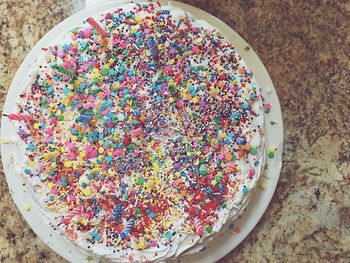 High angle view of multi colored candies in plate