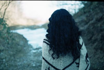 Close-up of woman against sea