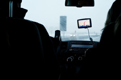 Rear view of woman driving car