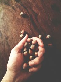 High angle view of hand holding ice cream
