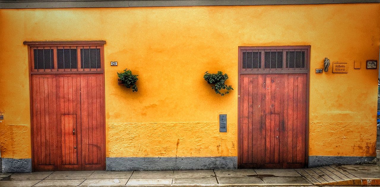 EXTERIOR OF YELLOW HOUSE