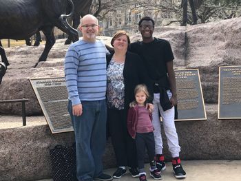 Portrait of smiling family standing outdoors