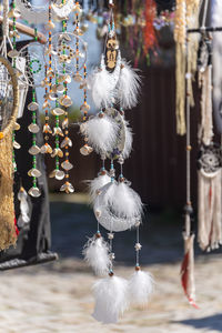 Close-up of decorations hanging in market