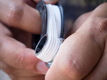 Midsection of person holding hands