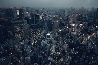 High angle view of city lit up