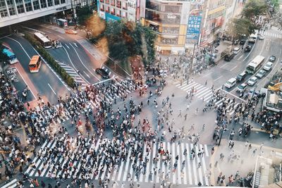 Aerial view of crowd on city street