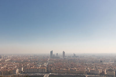 High angle view of european city against pollution 