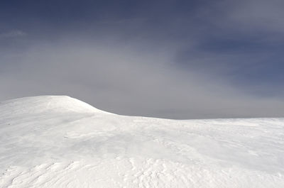 Snowcapped mountain against sky