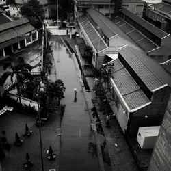 High angle view of street amidst buildings in city