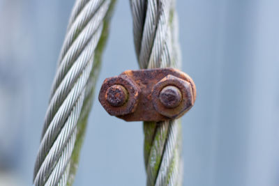 Close-up of rope tied on metal