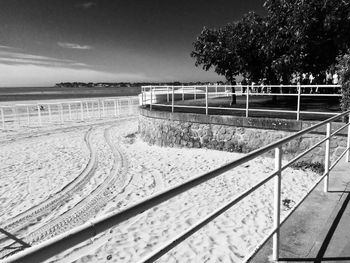 Train on railroad track against sky