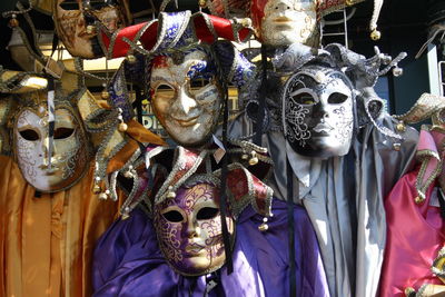 Various costumes for sale at market stall