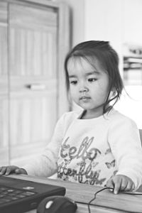 Portrait of a girl sitting at home