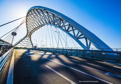 View of bridge against blue sky