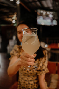 Close-up of woman drinking glass