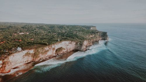 High angle view of sea shore against sky