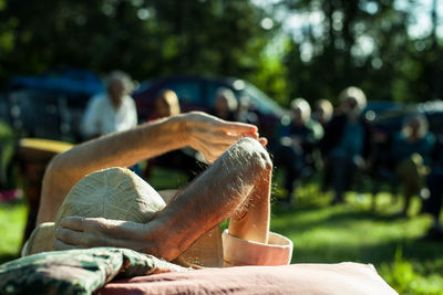 People relaxing in park