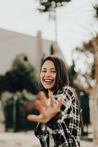 Portrait of smiling young woman