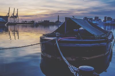 Close-up of ship moored at harbor