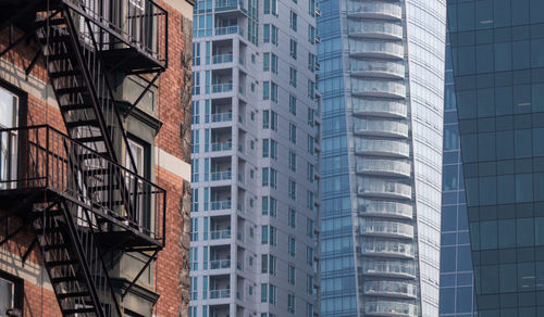 Low angle view of modern buildings in city