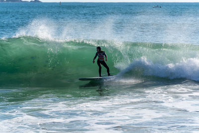 Man surfing in sea