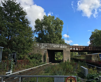 View of bridge against cloudy sky