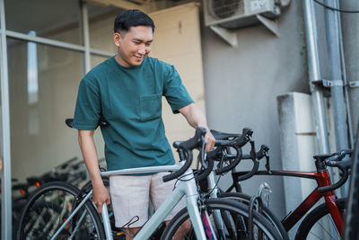 Man riding bicycle on street