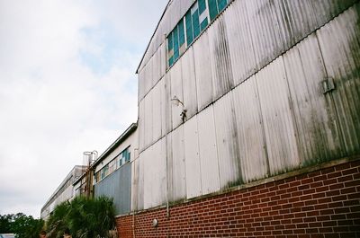 Low angle view of modern building against sky