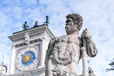 Low angle view of statue against sky