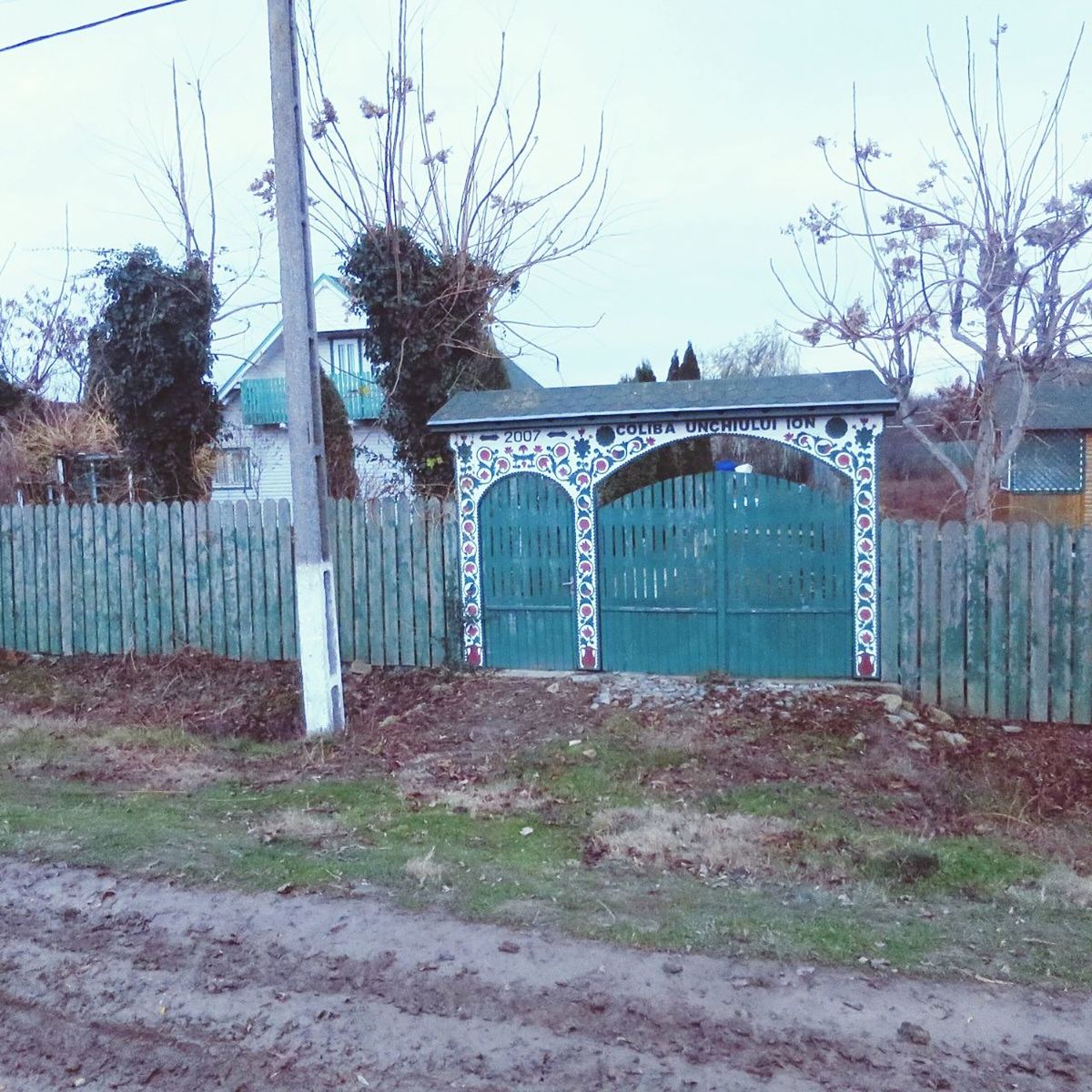 day, no people, built structure, architecture, outdoors, bare tree, tree, sky, building exterior, nature, grass