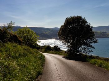 Country road with mountains in background