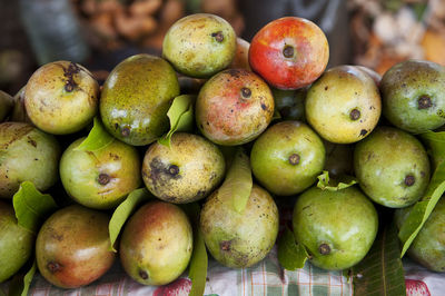 Close-up of stack mangos for sale