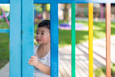 Portrait of cute boy looking away