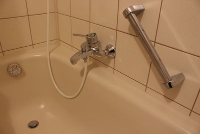 High angle view of faucet in bathroom